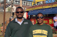 International students Dotun Opasina and Muchafara Punungwe at downtown Fitchburg event