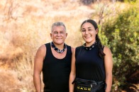 Promotional image of Mary Cardona Foster and her father on The Amazing Race