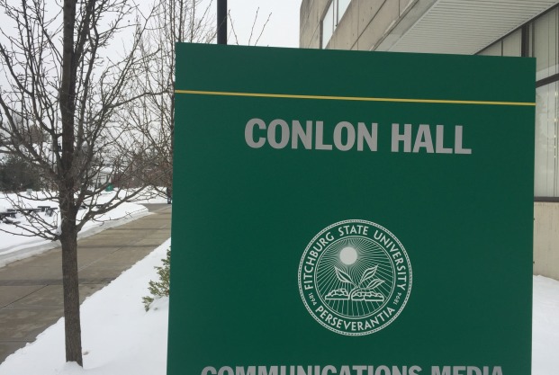 Conlon Hall sign outside building in winter