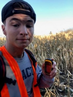 Jesse Corbin on a trail with a GIS