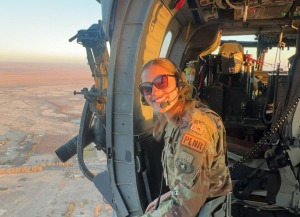 Image of Julia Gauvin in a helicoptor