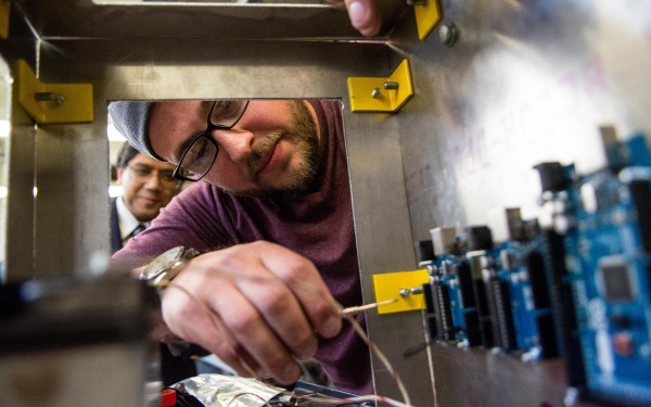 student in electronics engineering class