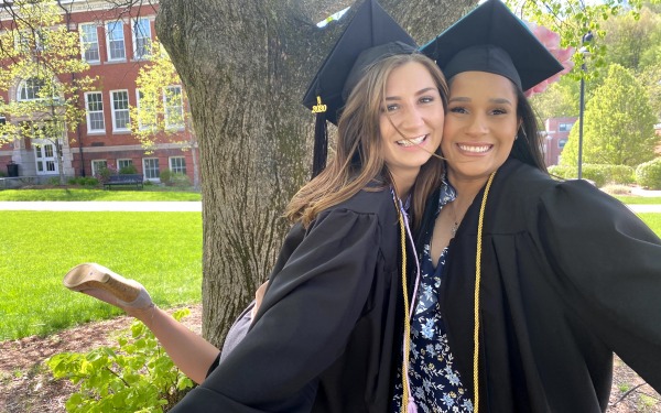 Graduates celebrating on quad