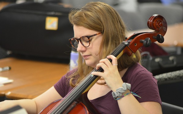 Student playing cello