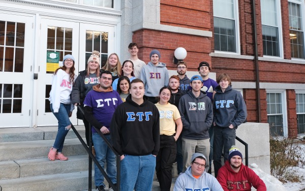 Greek Life Council Members on the stairs of Percival Hall