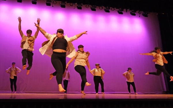 Action shot of a dance club students on stage in Weston