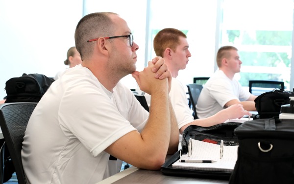 Police academy students sitting in a classroom