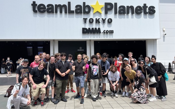 Group of game design students in Japan at team lab planets