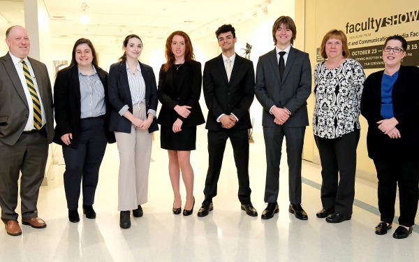 Moot court students and instructors in Hammond near gallery