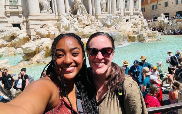 Taking selfie In front of a fountain on the Heart of Europe trip