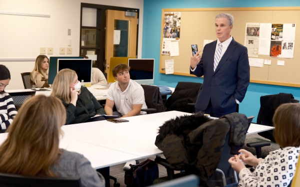 Attorney General Joseph Earley talking to students in DMI class