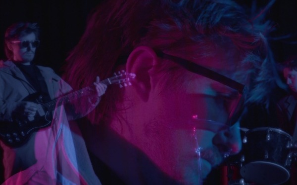 Still of Frames by Jonathan Kamal band playing instruments