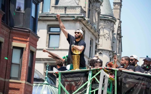 Jason Tatum on duck boat at the celebration parade in Boston