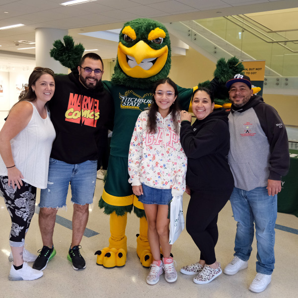 Freddy and Family at Open House in Hammond Hall.