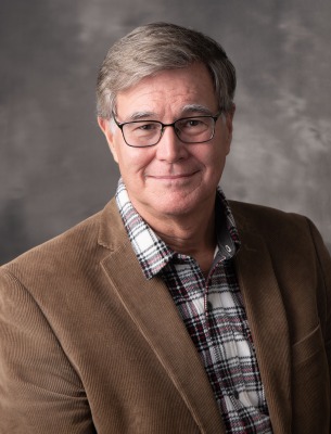 Headshot of Professor Michael Greenwood