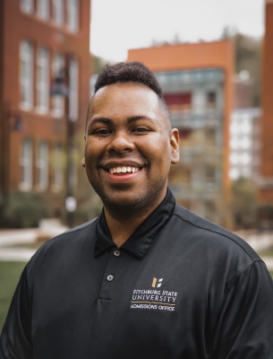 Portrait of Juan Orta in front of Thompson Hall/Hammond.
