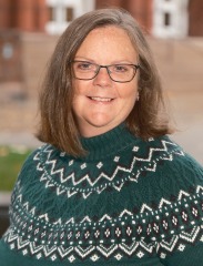 Jen Murray SGOCE headshot outside.