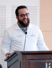 Angelo Prevosto Associate Director for Student Engagement at podium.