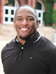 Headshot Darrien Waugh SU SUCCESS office. 