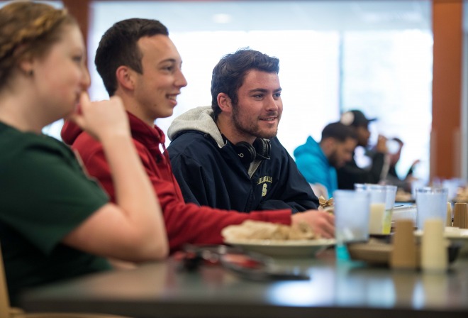 smiling students in the cafeteria 