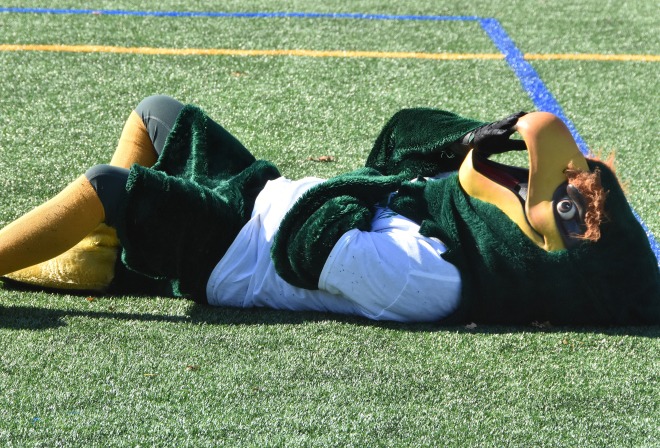 Freddy laying on the football field