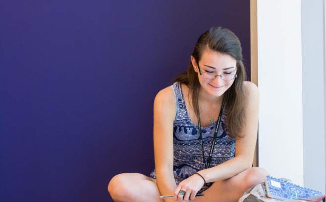 A student using her laptop to access an online course