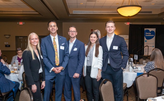 Photo of business students and bank officials at Chamber of Commerce event