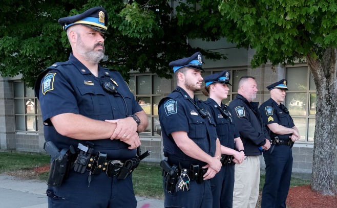 Police at 911 tribute in front of Fitchburg Fire Department