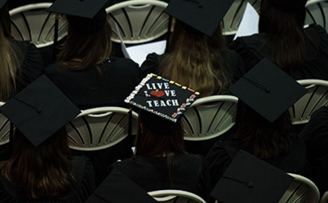 Graduation cap decorated to say &quot;Live Love Teach&quot;