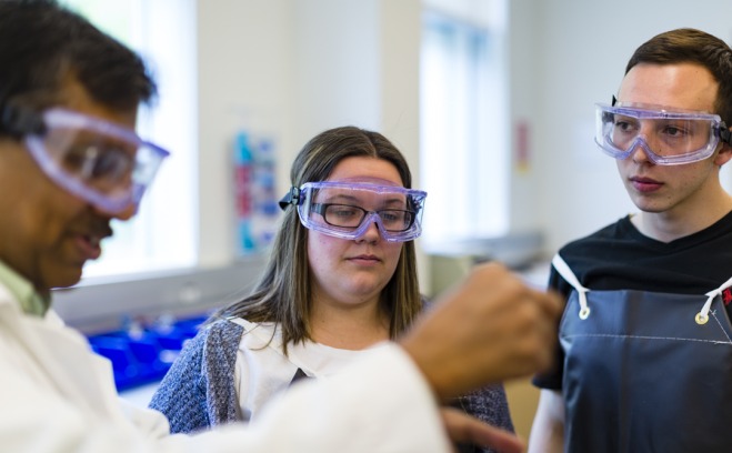 Chemistry faculty and students in lab