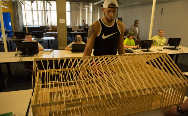 student with construction project