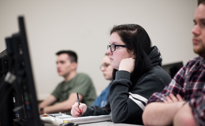 students in class at computers