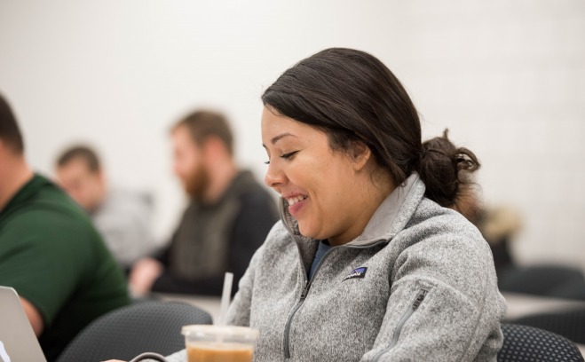 Female student smiling in classroom