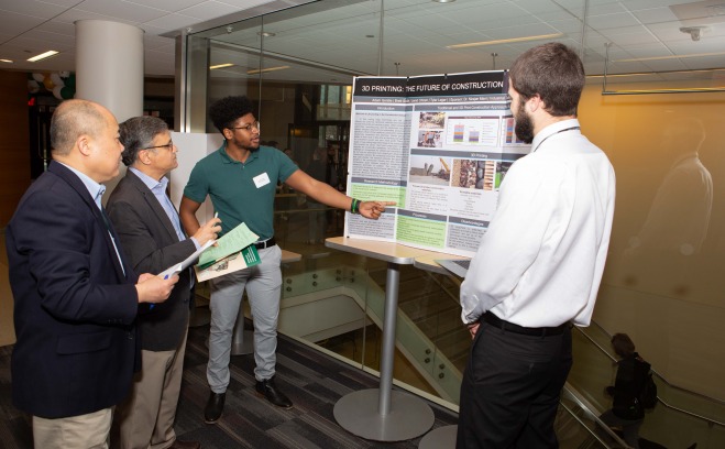 students discussing a presentation