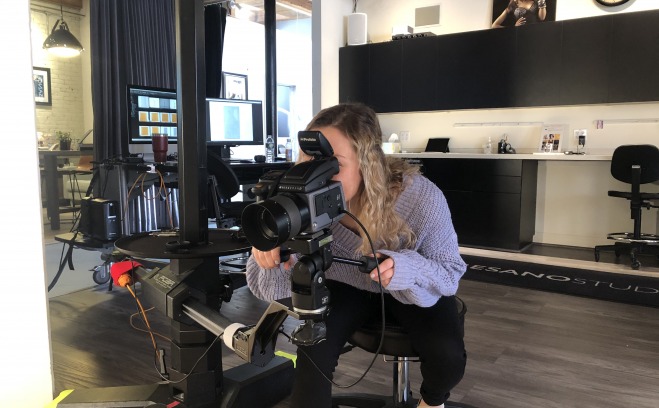 Girl behind a camera at internship