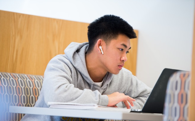 Student using a laptop