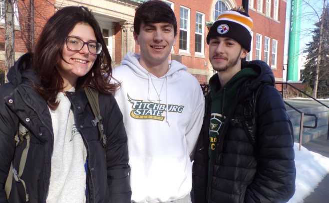 Two male and one female student in front of Edgerly Hall