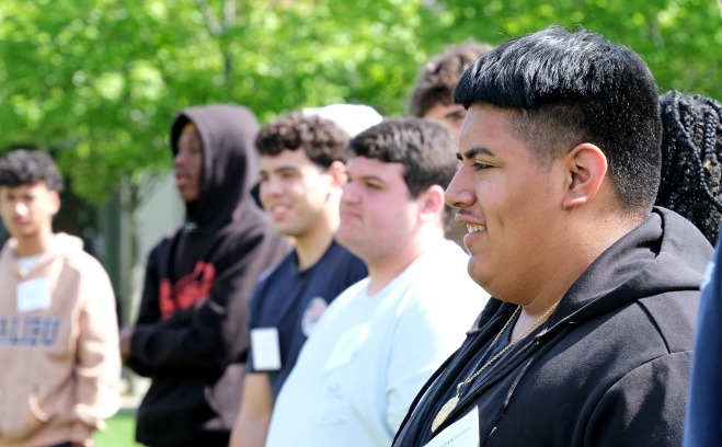 Male students on quad at orientation