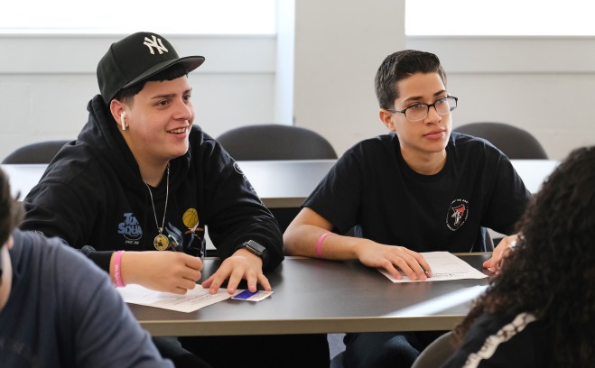 Two male high school students in classroom