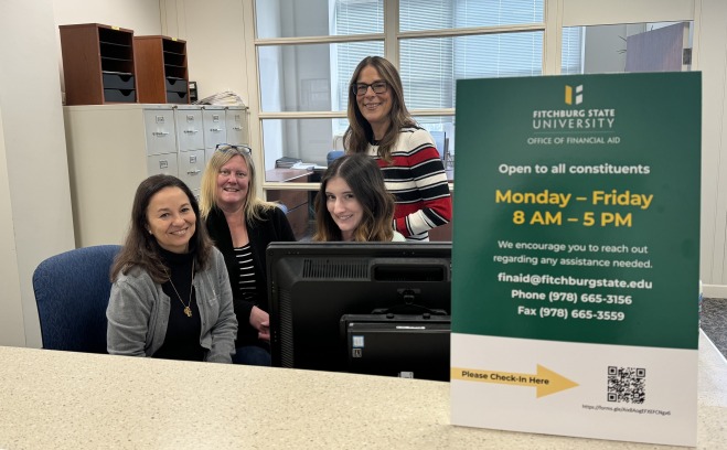 Four of the members of the financial aid team