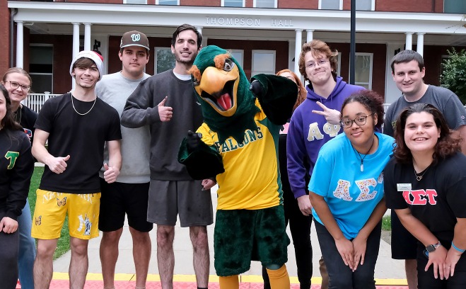Greek life with Freddy on quad in front of Thompson
