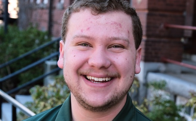 Christopher Bjornson Orientation Leader outside.