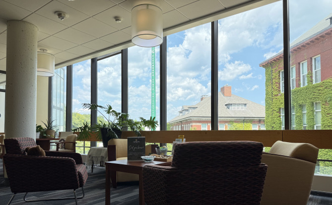 View of inside the counseling office waiting area with smokestack out the window