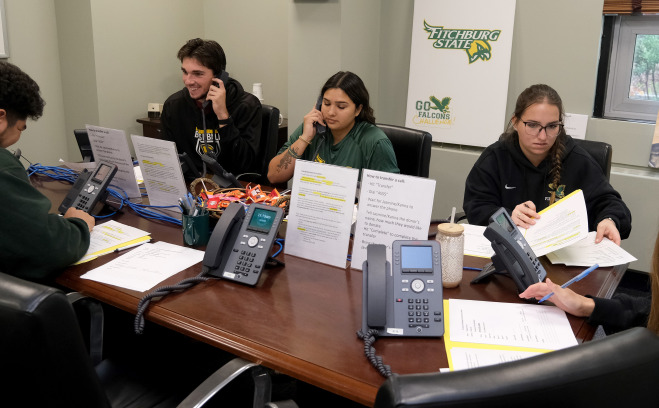 Go Falcons Challenge student athletes and Freddy working the phones