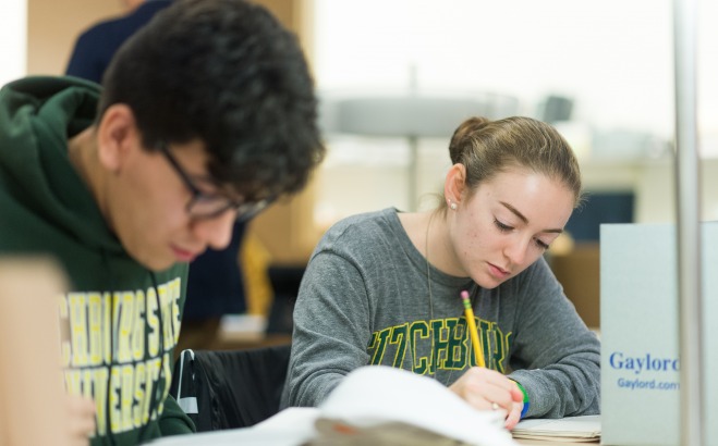 Students work in the library archive