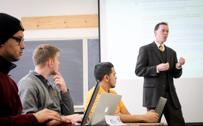 Professor Josh Spero speaking to his class 