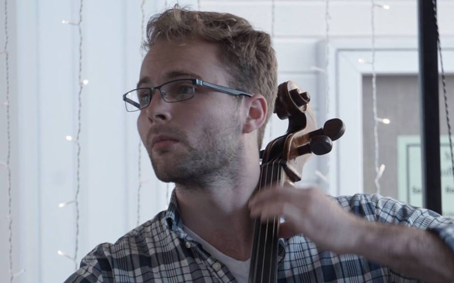 Alex Fowler playing cello.