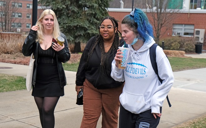 Female students walking on the quad