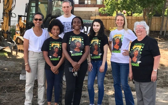 Group of faculty and community members at the Abolitionist Park on Snow St.