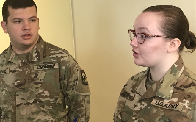 Male and female student veterans in fatigues